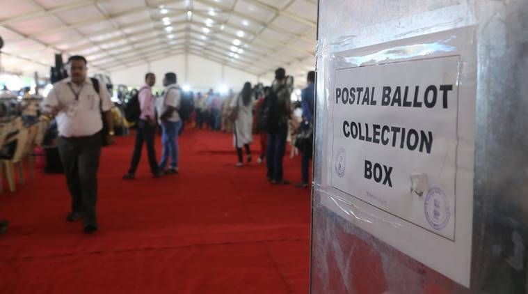 cédulas postais, o que são cédulas postais, controvérsia sobre cédulas postais, cédulas postais Covid, votação por cédulas postais, eleições bihar, Indian Express