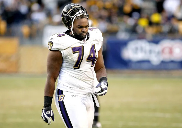 Michael Oher promete buscar 'Justiça' enquanto o autor de 'The Blind Side', Michael Lewis, pondera