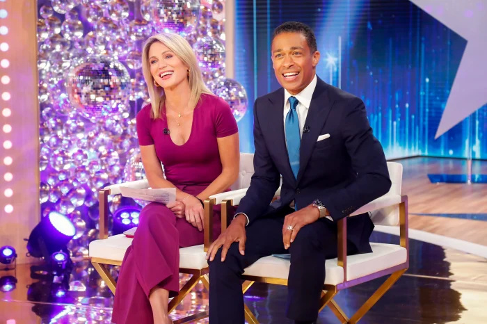   Casado'Good Morning America’ Anchors Amy Robach and T.J. Holmes Spotted Getting Cozy