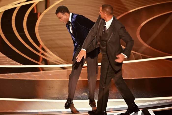   Chris Rock marca data para especial ao vivo da Netflix quase 1 ano após o tapa em Will Smith