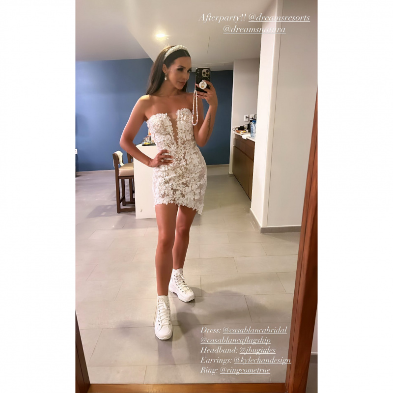   Scheana Shay deslizou em um mini vestido floral e tênis robustos para seu casamento depois da festa
